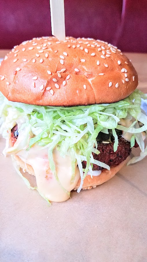 Bunk Bar at Water Ave, evenings only vegetarians (and it can also be made vegan) can get a black bean burger that still delivers on flavor thanks to roasted green chilies, pepper jack, avocado, mayo, hot sauce, and shredded lettuce