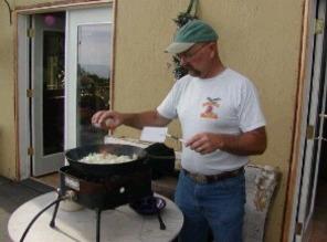 Blackening Wild Alaskan Seafood on deck overlooking Kachemak Bay