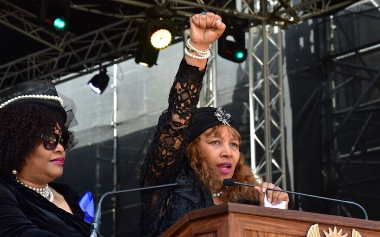 Winnie Madikizela-Mandela's daughter Zenani Mandela-Dlamini gave a moving speech at her mother's funeral at Orlando Stadium. Her younger sister Zindzi Mandela stands beside her.