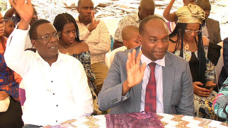 Former Mwea MP Alfred Nderitu and former Kirinyaga deputy governor Peter Ndambiri during a prayer event held in Mwea.