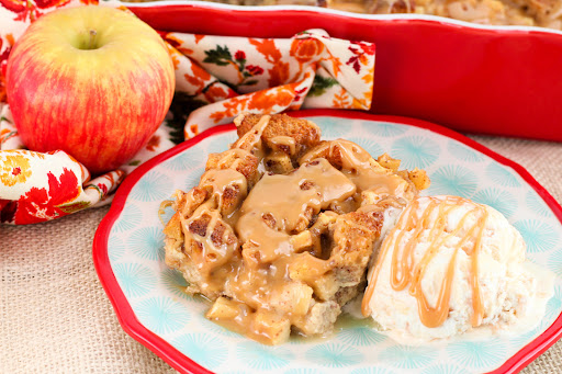 Slice of Late Night Caramel Apple Bread Pudding with ice cream.