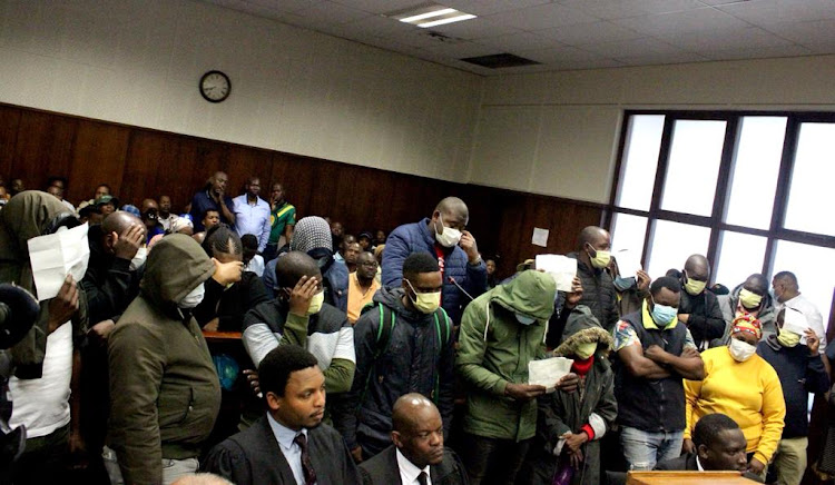 A group of 22 people appeared in the Durban magistrate's court on Friday facing charges of incitement after last year's July riots