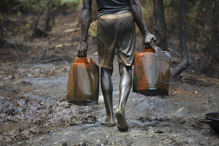 Nigeria oil. Picture: REUTERS/AKINTUNDE AKINLEYE