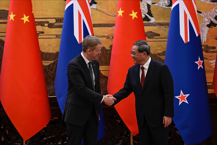 New Zealand Prime Minister Chris Hipkins shakes hands with Chinese Premier Li Qiang during a signing ceremony at The Great Hall Of The People on June 28 in Beijing, China. Picture: JADE GAO/GETTY IMAGES
