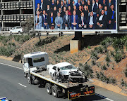 The car driven by Bosasa CEO Gavin Watson is transported from the accident scene where Watson reportedly died near the O.R. Tambo International Airport on August 26 2019 in Johannesburg, South Africa. 