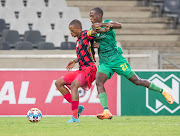 Pogiso Sanoka of TS Galaxy FC and Evidence Makgopa of Baroka Football Club during the 2022 Nedbank Cup Quarter Final match between TS Galaxy and Baroka FC.