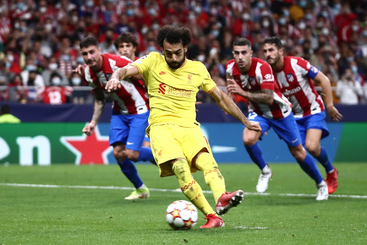 Liverpool's Mohamed Salah scores from the penalty spot in their Champions League Group B game against Atletico Madrid at Wanda Metropolitano, Madrid on October 19, 2021