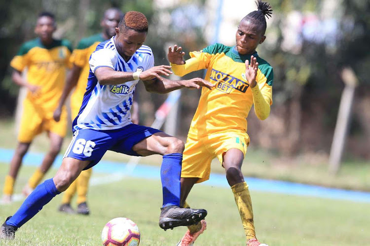 Sebastine Ikekhai shields the ball from Mathare's James Kinyanjui in a past league match