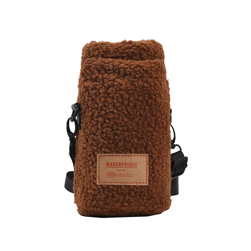 Bolso cubo de terciopelo de cordero de exportación, tendencia moda. Elegante y funcional para llevar tus esenciales con estilo y sofisticación.