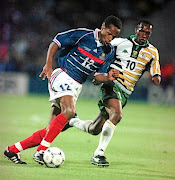 Thierry Henry of France  tries to get past SA's John Moshoeu at the 1998 World Cup in France.