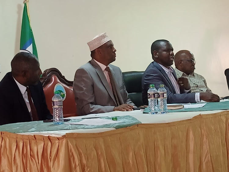 Marsabit Governor Mohamud Ali with acting county commissioner David Saruni during county steering group meeting in Saku