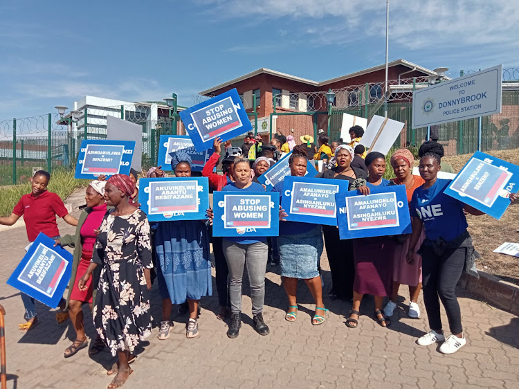 Women opposed to violence against women and children protest outside the Donnybrook magistrate's court on the KZN south coast on Thursday during Baphumelele Zulu's appearance.