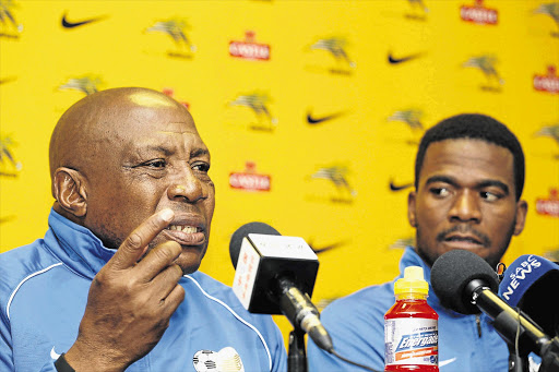 MAKE US PROUD: Ephraim 'Shakes' Mashaba, coach of Bafana Bafana, and Senzo Meyiwa, the team's goalkeeper, address the media yesterday before tonight's Afcon qualifying match against the Super Eagles of Nigeria