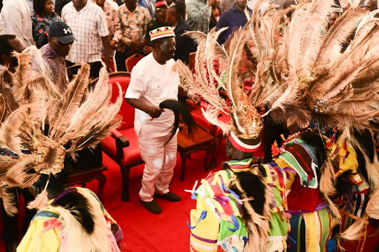 ODM leader Raila Odinga join Kochia dancers at Ofafa Memorial Hall in Kisumu on Friday, December 22, 2023.