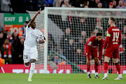 Vinicius Junior of Real Madrid celebrates a goal in their Uefa Champions League win against Liverpool at Anfield in Liverpool on February 21 2023.