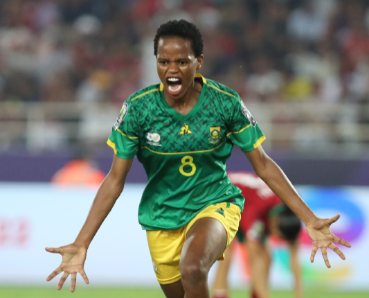 Banyana Banyana's Hildah Magaia celebrates her goal in the 2022 Women's Africa Cup of Nations final against Morocco at Stade Prince Moulay Abdellah in Rabat, Morocco on July 23 2022.