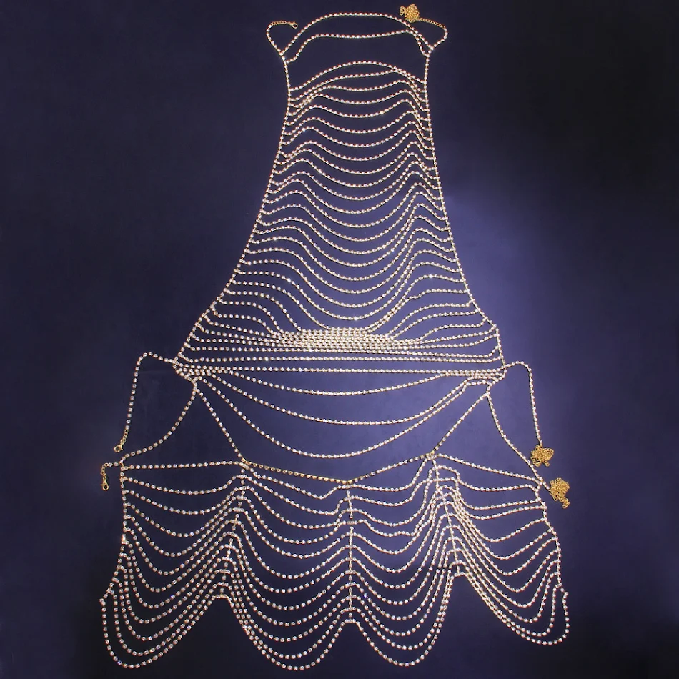 Nieuwe trend Strass body chain voor nachtclubfeesten. Maak een statement met deze glinsterende en opvallende party accessoire. Perfect voor de dansvloer