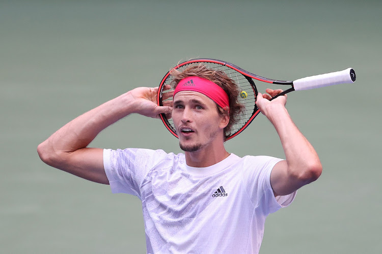 Alexander Zverev argues a call with the chair umpire during his quarterfinal match against Borna Coric.