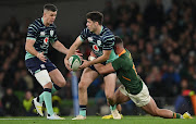 Jimmy O'Brien of Ireland is tackled by Jesse Kriel of South Africa during the 2022 Castle Lager Outgoing Tour match at Aviva Stadium on November 05 in Dublin. 