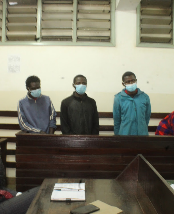 Kennedy Nyongesa Mugodo, Alexander Litunda Ikocheli and Evans Ouma at the Kibera law courts