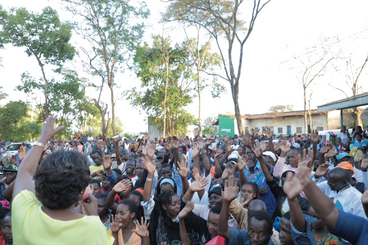 Kitui Governor Charity Ngilu moves the public to endorse plans to move Syongila vocational centre during a public participation meeting on Sunday.