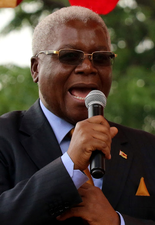 Zimbabwe's Finance Minister Ignatius Chombo speaks at a rally of the ruling ZANU PF party in Harare, Zimbabwe November 8, 2017.