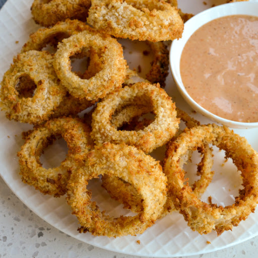 These fun and easy Air Fryer Onions Rings are flavor packed and perfectly crispy without all the added fat and oil from deep frying.