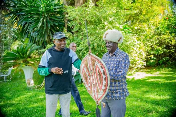 Public Service CS Moses Kuria with ODM leader Raila Odinga during a reconciliation meeting at the Odinga's Karen home on April 7, 2024.