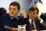 Eugene de Kock, left, appears at the Truth And Reconciliation Commission (TRC) amnesty hearing with his lawyer Schalk Hugo on May 24 1999. 