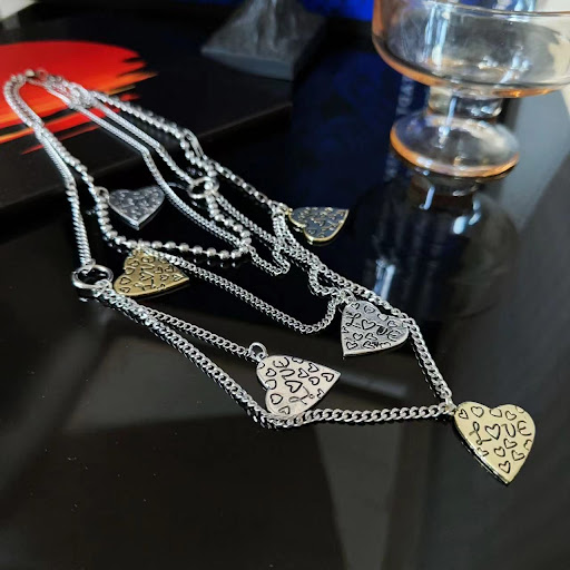 Title 4, Special-interest design necklace, combining lig...