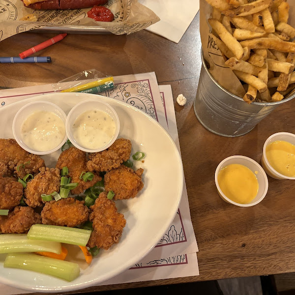 Boneless wings with no sauce and fries. Very tasty!