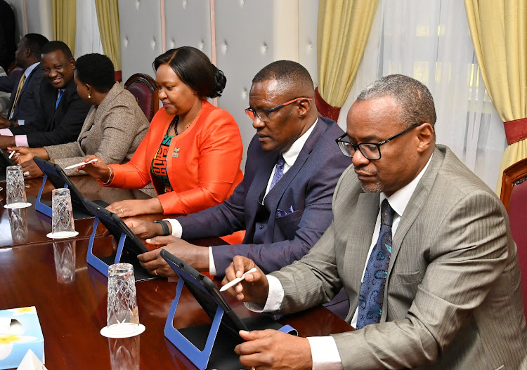 Members of the cabinet during the first paperless Cabinet meeting at State House on January 31, 2023