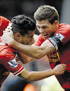 the kop boys: Liverpool's Philippe Coutinho, left, celebrates with Steven Gerrard after a win