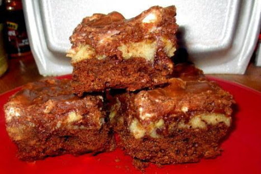 Rocky Road Fudge Bars..AKA: Bitchin' Brownies.
My former employee, Stephanie, gave them that name when she worked at my bakery 24 yrs ago. She loved them so much that she sid they were 