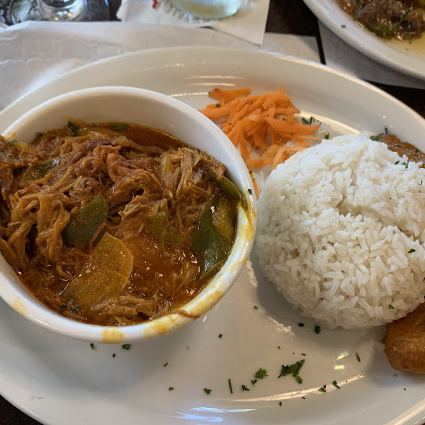 Ropa vieja with rice and beans and sweet plantains