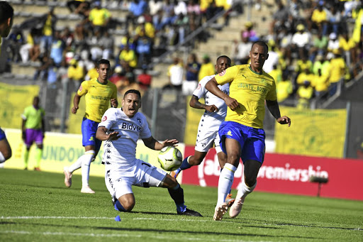 Cole Alexander of Bidvest Wits is fouled by Wayne Arendse of Sundowns. Arendse was fielded against Wits in October even though he was not in Downs' match-day squad. /Lefty Shivambu/ Gallo Images