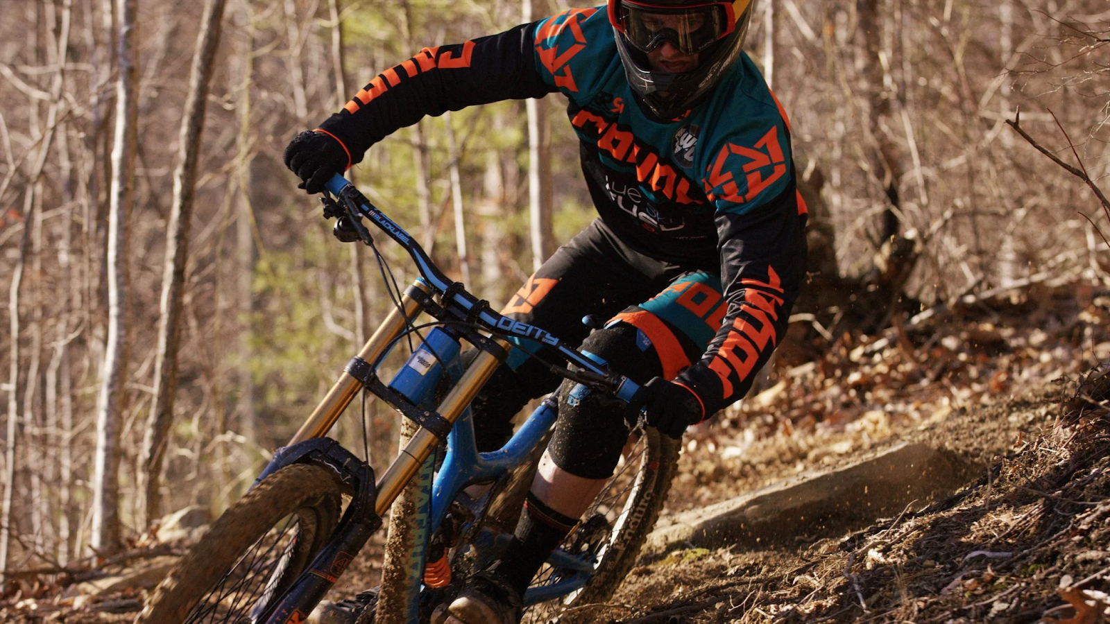 The main difference between riding with mountain bike drop bars vs. flat bars is the position of your body.