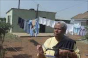 BROKEN PROMISES: There is a lot of poverty and crime in Evaton West. Stokie Kebela is one of the many people who are suffering from the unhealthy conditions. Pic. Len Kumalo. 10/11/06. © Sowetan.