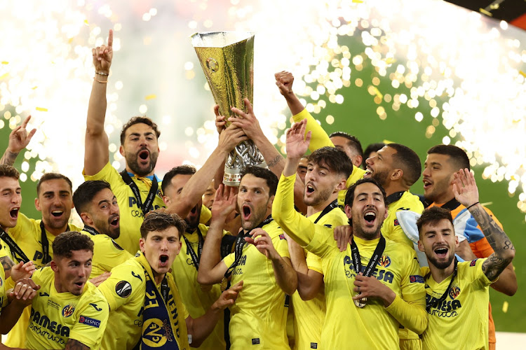 Villarreal players celebrate winning the Europa League final on May 26, 2021