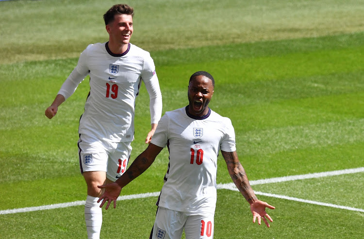 England's Raheem Sterling celebrates with Mason Mount after scoring