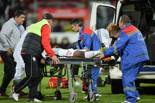 Dinamo Bucharest's Patrick Ekeng is transported to an ambulance after collapsing during a play-off match against Viitorul Constanta in Bucharest, Romania. Picture Credit: Reuters