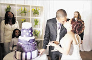 Flashback: The wedding of Derek Matthee and Gail Brookstein who had never seen each other until their wedding day in 2 Strangers and a Wedding - a Kaya FM competition last year.
Pic. James Oatway. 30/05/2009. © ST.
Cutting the cake... Wedding of 