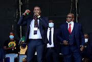 Former president Jacob Zuma and his son Duduzane sharing a stage outside the Pietermaritzburg High Court. 