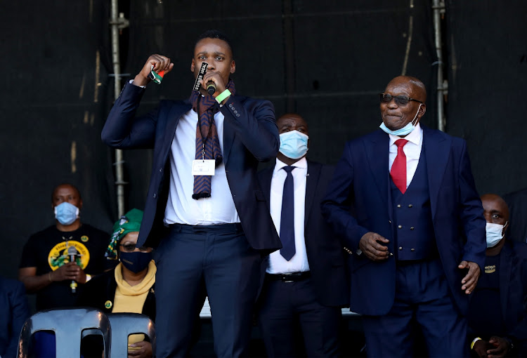 Former president Jacob Zuma and his son Duduzane sharing a stage outside the Pietermaritzburg High Court.