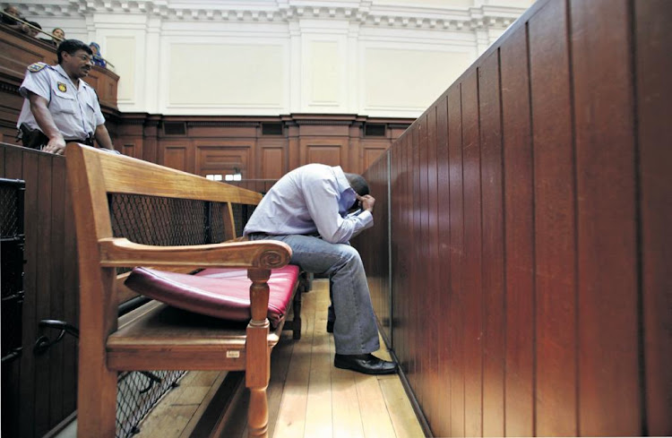 The man who arranged Anni Dewani's murder, Zola Tongo, during his sentencing in the high court in Cape Town in 2010.