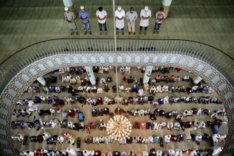 Muslims attend Friday prayer at the Baitul Mokarram National Mosque amid concerns about the spread of Covid-19 in Dhaka, Bangladesh, on March 20 2020.