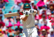 Australia's captain Steve Smith prepares to hit a boundary during the third day of the fifth Ashes cricket test match. 