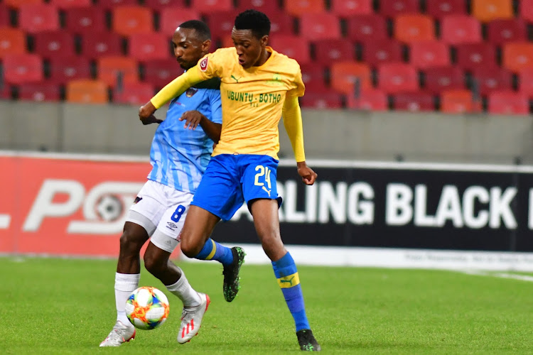 Sammy Seambi wins the ball from Thabo Rakhale of Chippa United during an Absa Premiership match in Port Elizabeth.