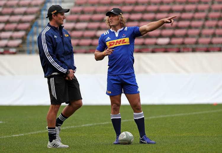 Werner Kok of Western Province (l) chats to backs coach Dawie Snyman during the Western Province training session at Newlands Stadium, Cape Town on 7 September 2016.