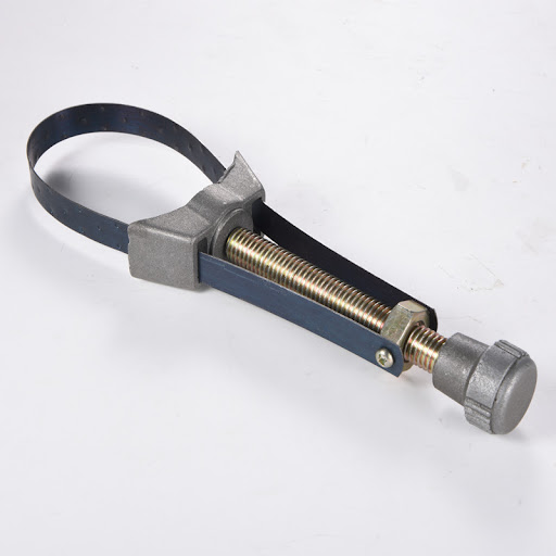 Title 2, Oil grid removal tool with wrench simplifies en...
